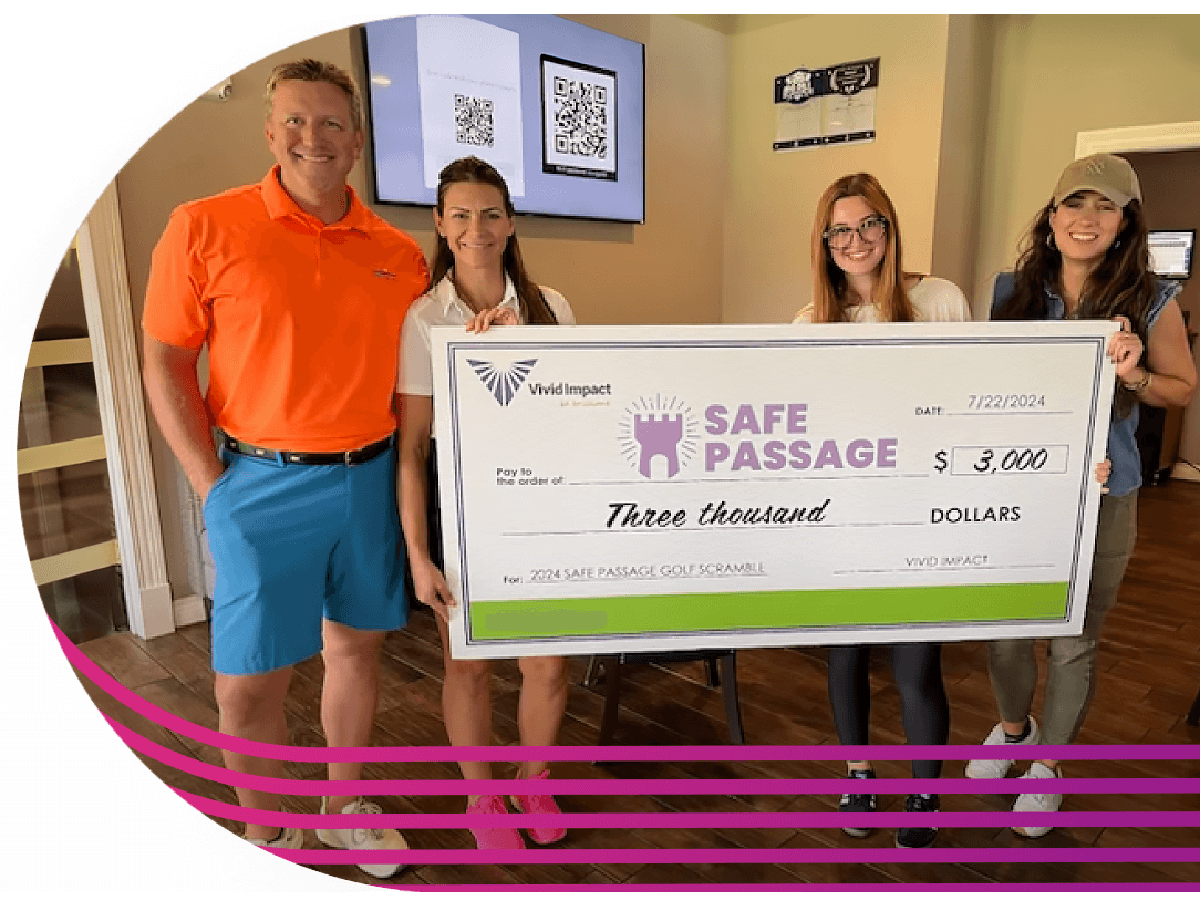 Safe Passages team with check
