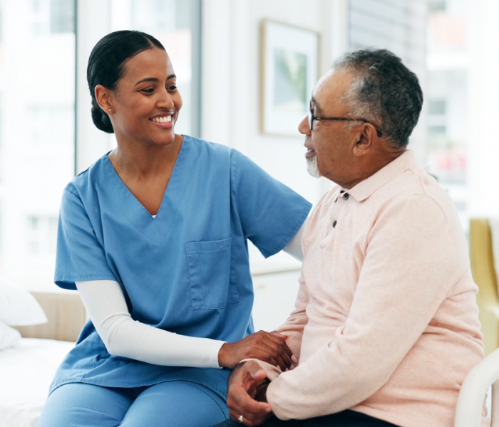 healthcare worker speaking to a patient