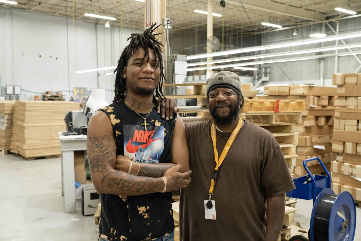 two men in warehouse
