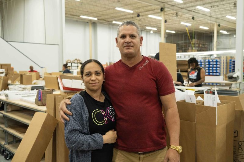 Two employees in warehouse